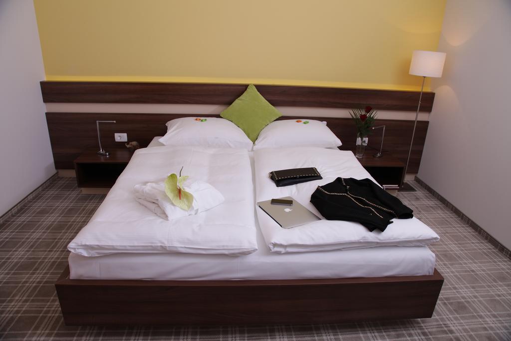 Primus Hotel & Apartments Viena Quarto foto